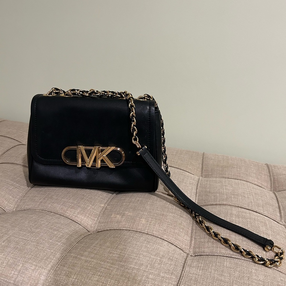 Michael Kors black leather bag. Brand new with tags. Smoke free home